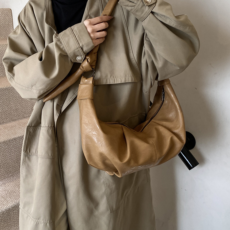 Free shipping designer Lazy Style Croissant Bag New Retro Niche Single Shoulder Bag Women Crossbody Bag High-end Pleated Dumpling Bag