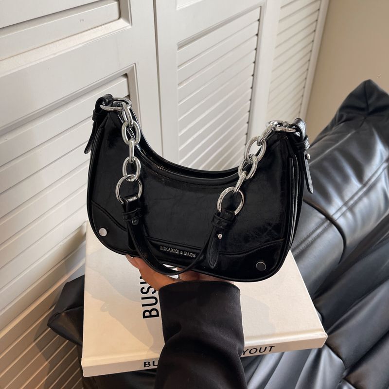Niche Handheld Underarm Free Shipping Luxury Bag Designer Bag Bag For Women Summer New High End Silver Bag Fashion Chain Shoulder Crossbody Bag