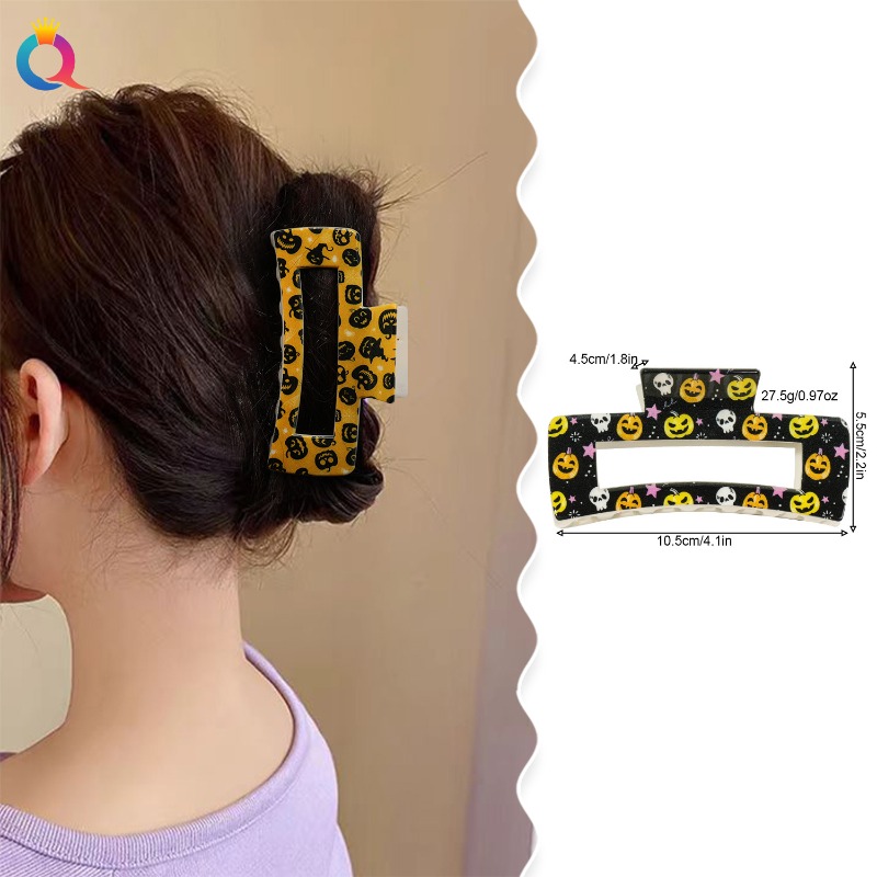 Ghoulishly Chic: Spooky Orange Skull Clips Perfect for Girl's Trick-or-Treat Outfits