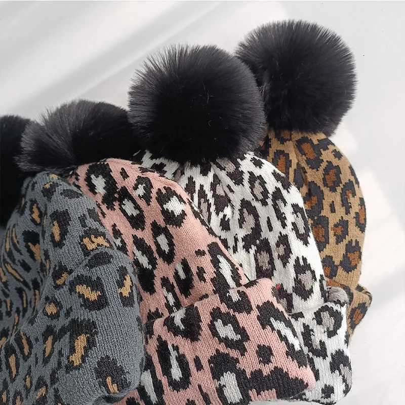 Tren new autumn and winter simulation leopard print large wool ball pulr knitted hat for couples stylish and versatileXJ250910