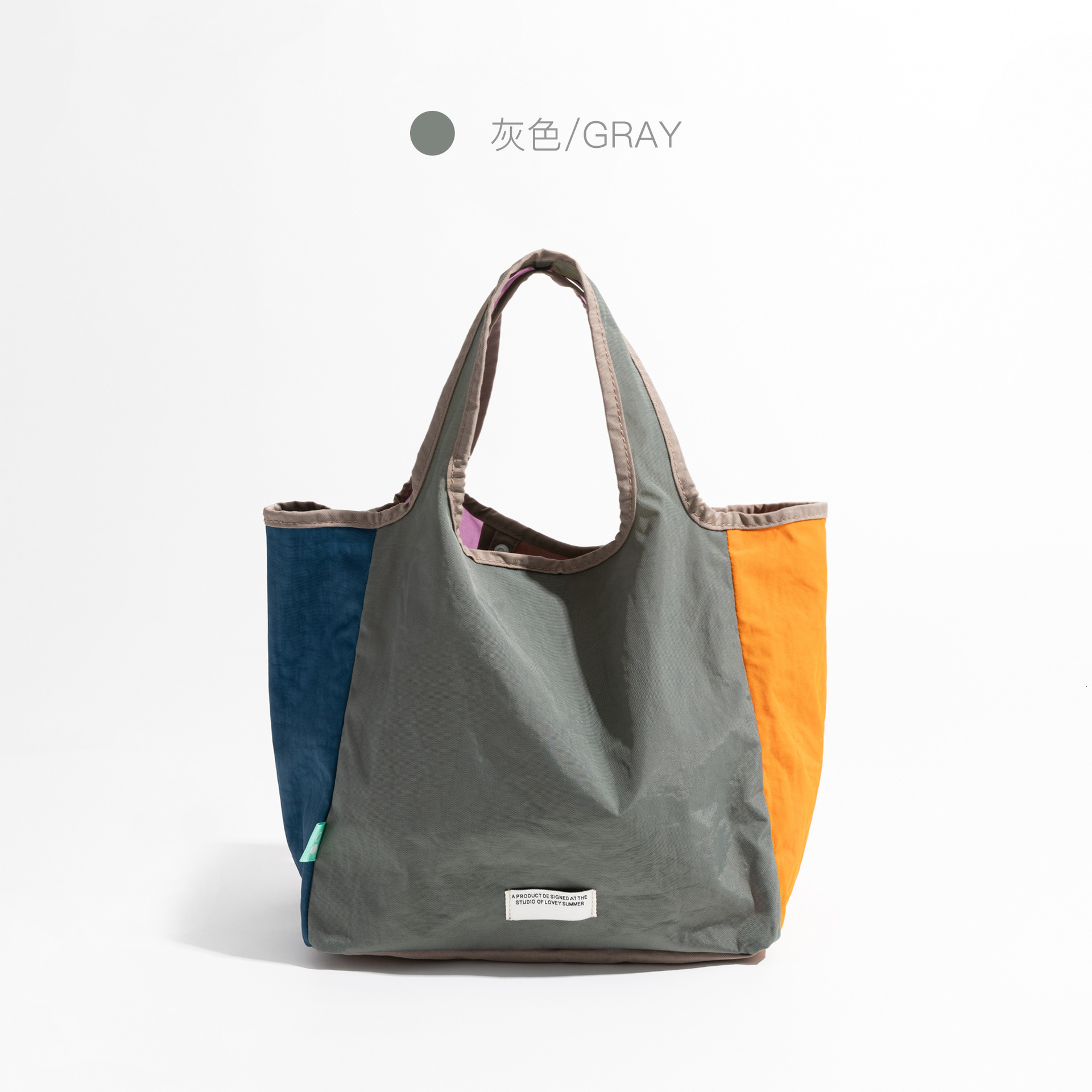 2025 designer's new color blocked foldable shoulder bag