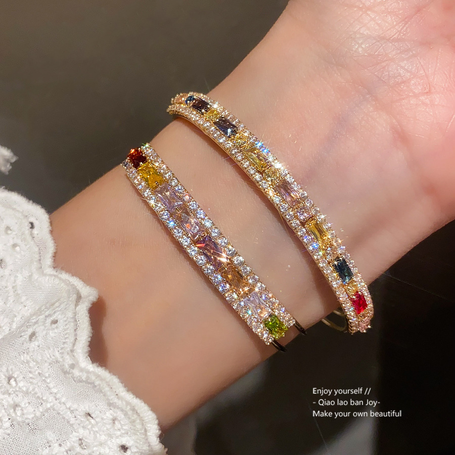 Gold-Tone Open Bangle With Mixed Color Baguette-Cut Crystals White Pave Detailing, Vibrant Luxe Style, Perfect For Elevating Party