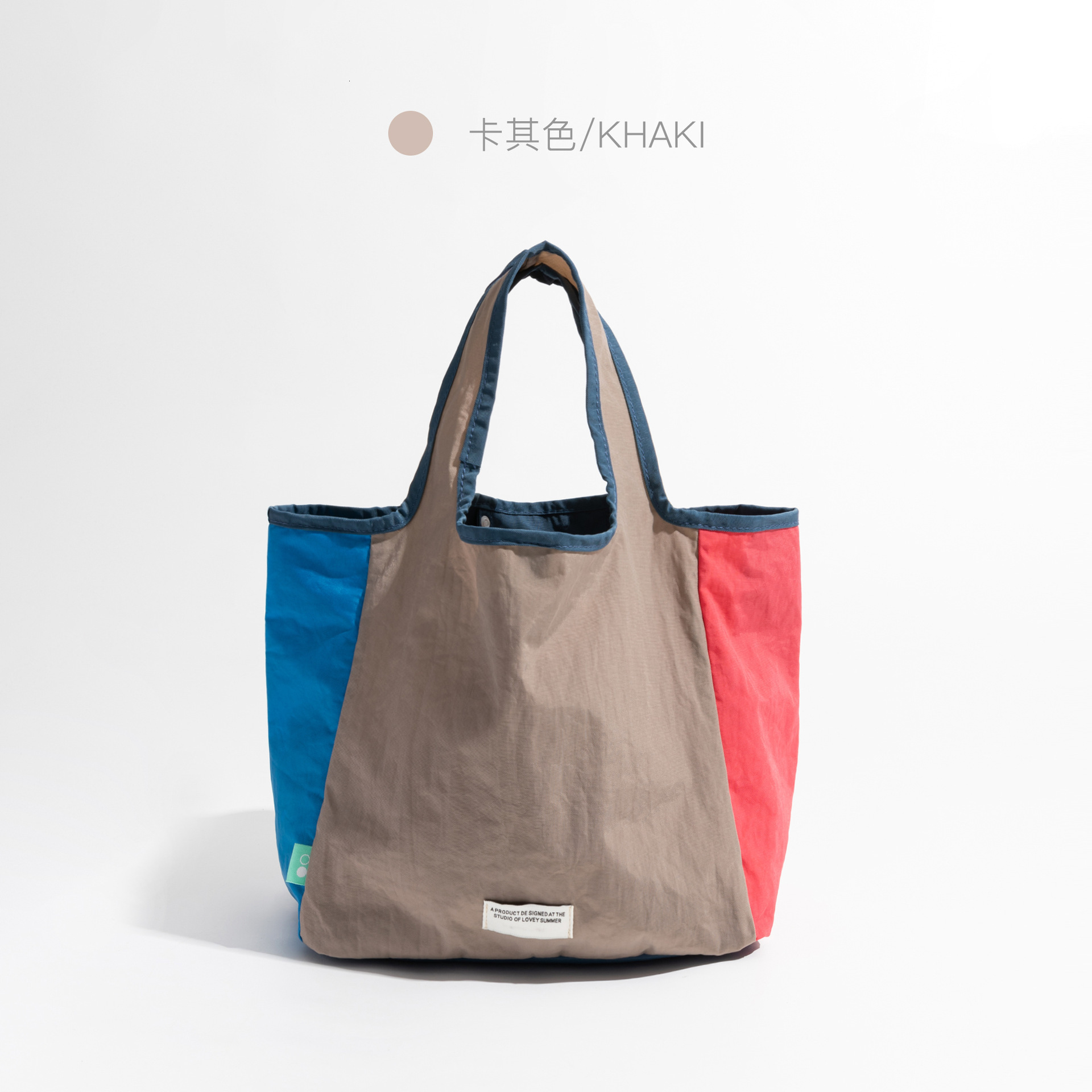 2025 designer's new color blocked foldable shoulder bag