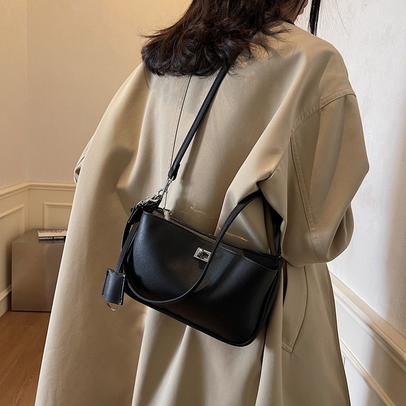 Free shipping designer Fashion Trend Versatile Bag Crossbody Bag for Women New Simple Casual Small Square Bag High-end Niche Shoulder Bag