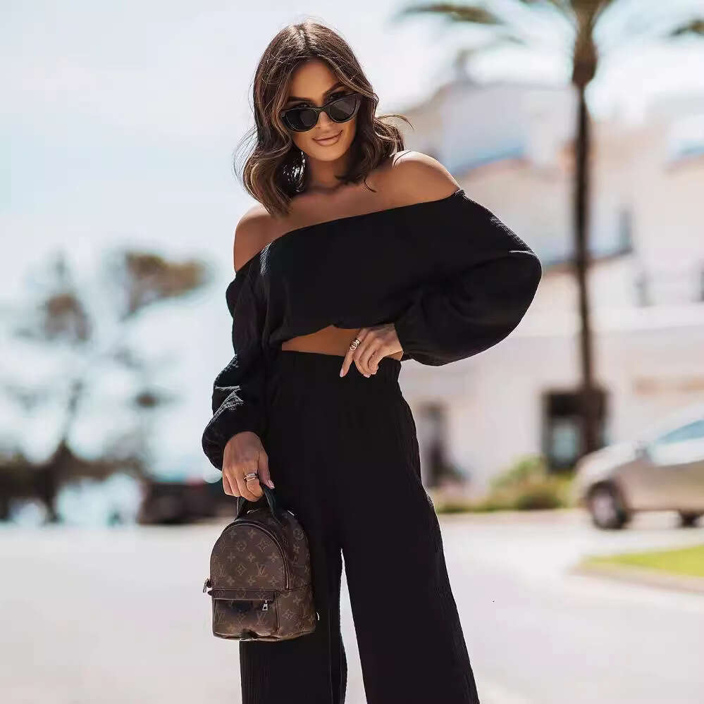 2024 European and American new short-sleeved off-shoulder top straight-leg pants solid color commuting two-piece set