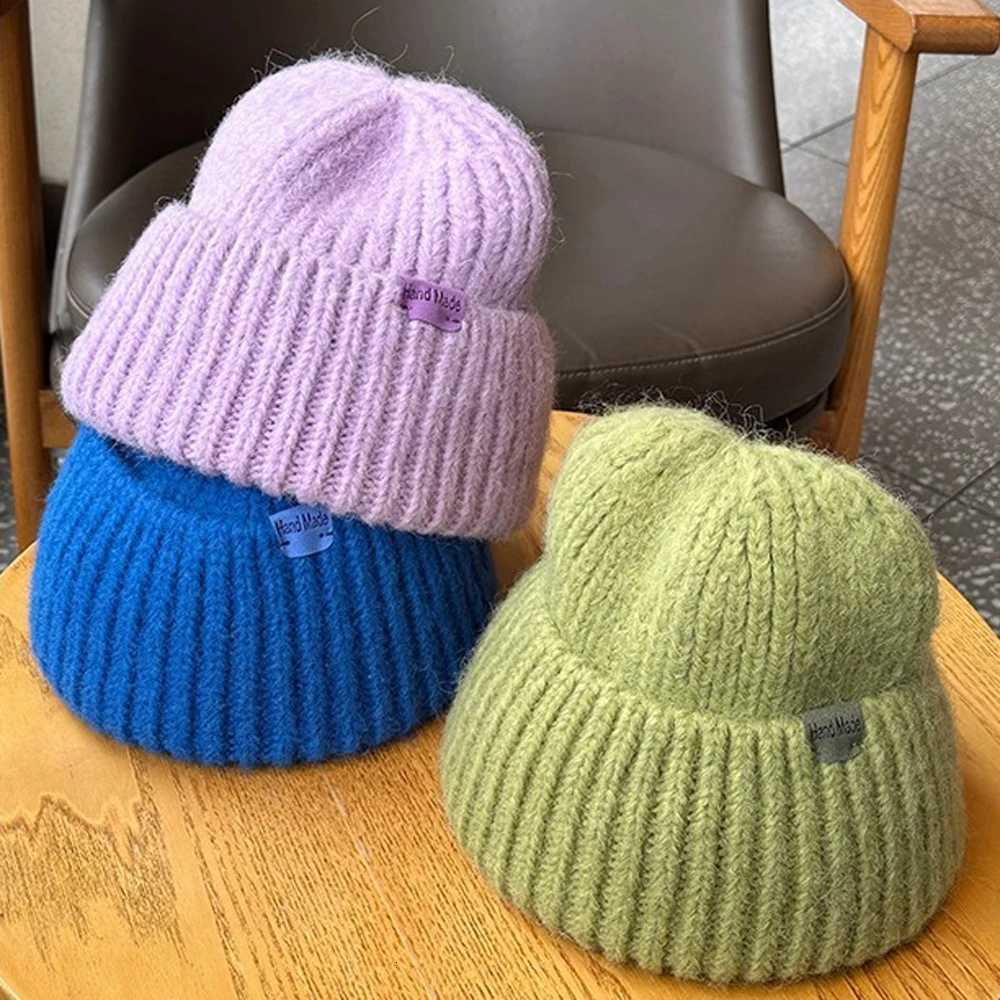 Thick solid color large head knitted hat for men and women in winter to keep warm show off face small ear protection woolen hatXJ250910