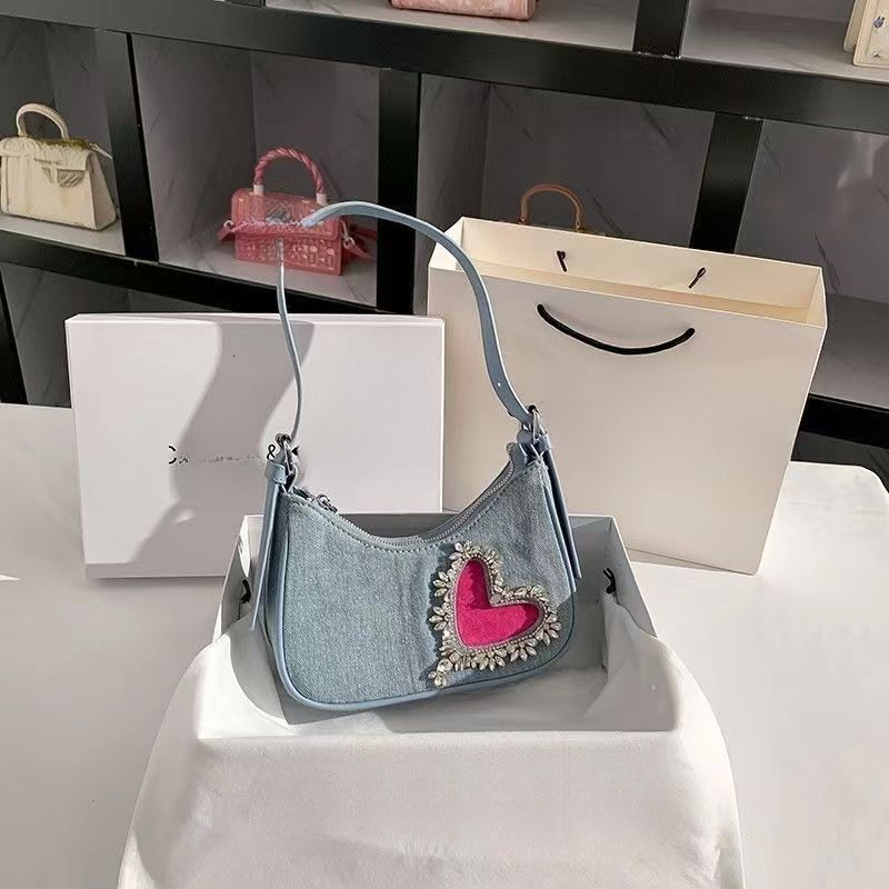 2025 autumn new denim tassel heart-shaped armpit bag French light luxury versatile niche bag design women's shoulder bag designer bag