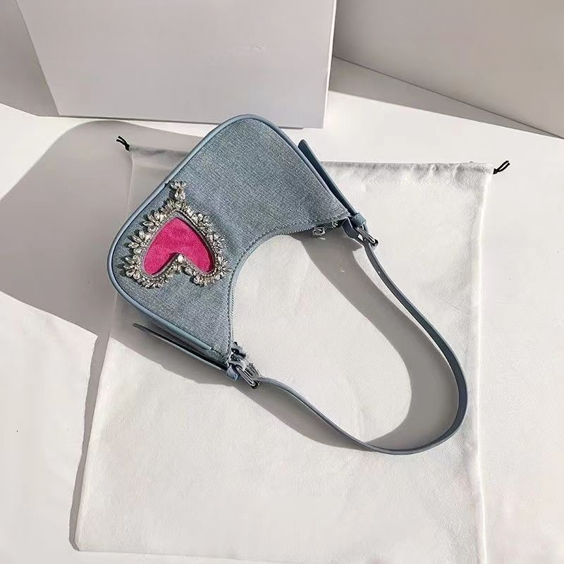 2025 autumn new denim tassel heart-shaped armpit bag French light luxury versatile niche bag design women's shoulder bag designer bag