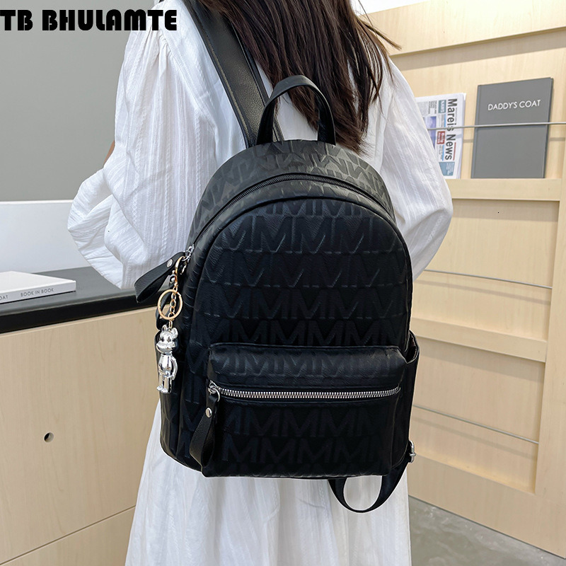 Free Shipping Designer Bag 2025 New Women's Backpack British Luxury Bag Style Embossed Letter Backpack Commuter Soft Leather Texture College Stud