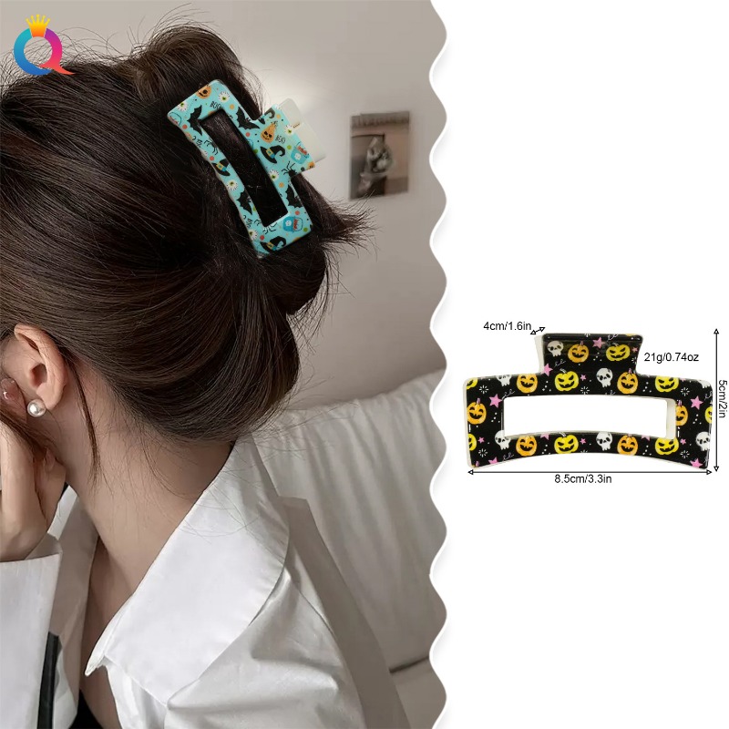Ghoulishly Chic: Spooky Orange Skull Clips Perfect for Girl's Trick-or-Treat Outfits