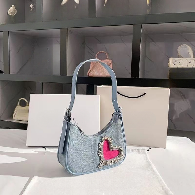 2025 autumn new denim tassel heart-shaped armpit bag French light luxury versatile niche bag design women's shoulder bag designer bag