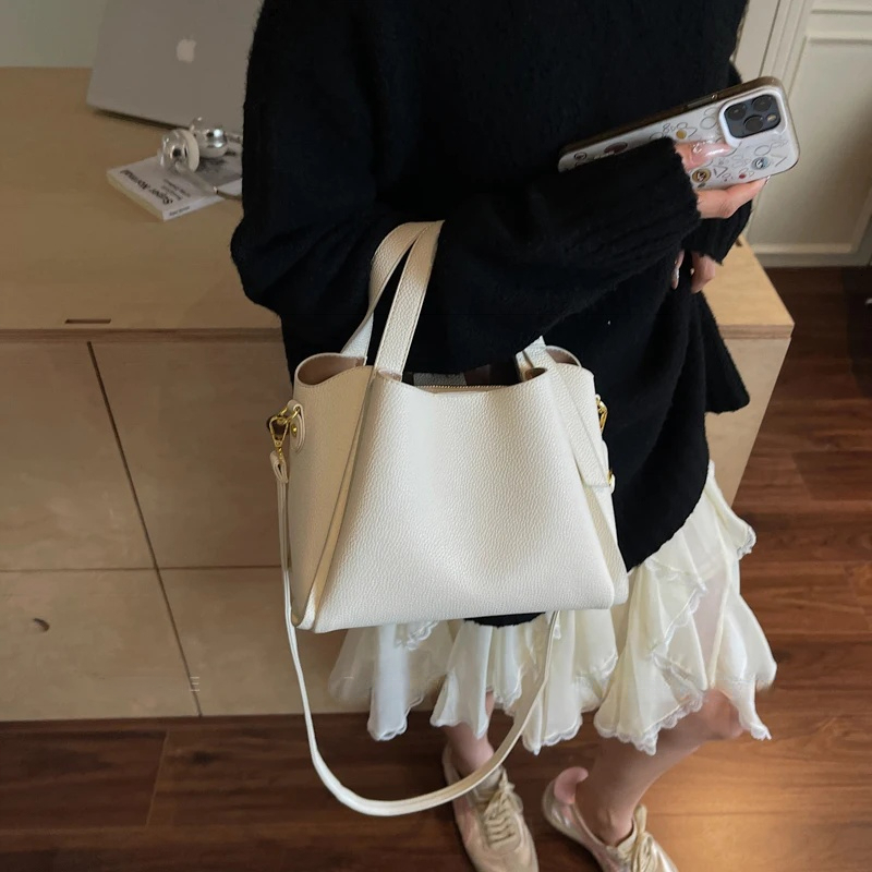 PU leather bucket bag women s shoulder bag short handle solid color simple style autumn new item lychee pattern designer bag women s crossbody bag tra