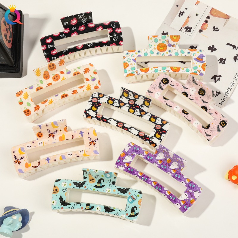 Ghoulishly Chic: Spooky Orange Skull Clips Perfect for Girl's Trick-or-Treat Outfits