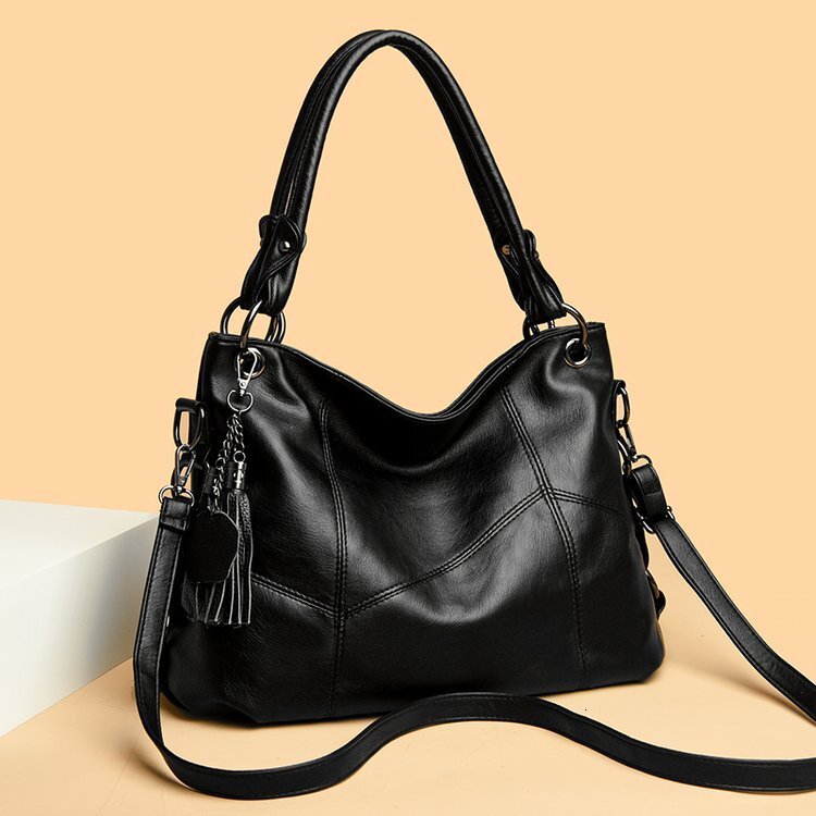 Free shipping designer New Large Polyester Retro Bag Fashion Patchwork PU Tassel Handbag Shoulder Bag Tote Bag Crossbody Bag Commuter Bag Women Bag