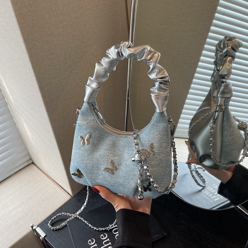 2025 autumn new Korean fashion light luxury butterfly niche design versatile trendy handbag women's denim dumpling bag designer bag