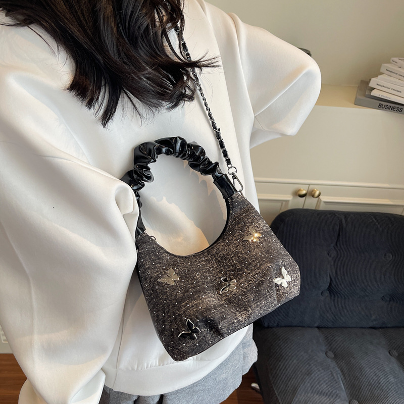 2025 autumn new Korean fashion light luxury butterfly niche design versatile trendy handbag women's bag denim dumpling bag designer bag