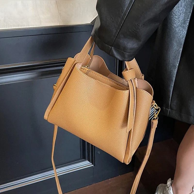 PU leather bucket bag women s shoulder bag short handle solid color simple style autumn new item lychee pattern designer bag women s crossbody bag tra