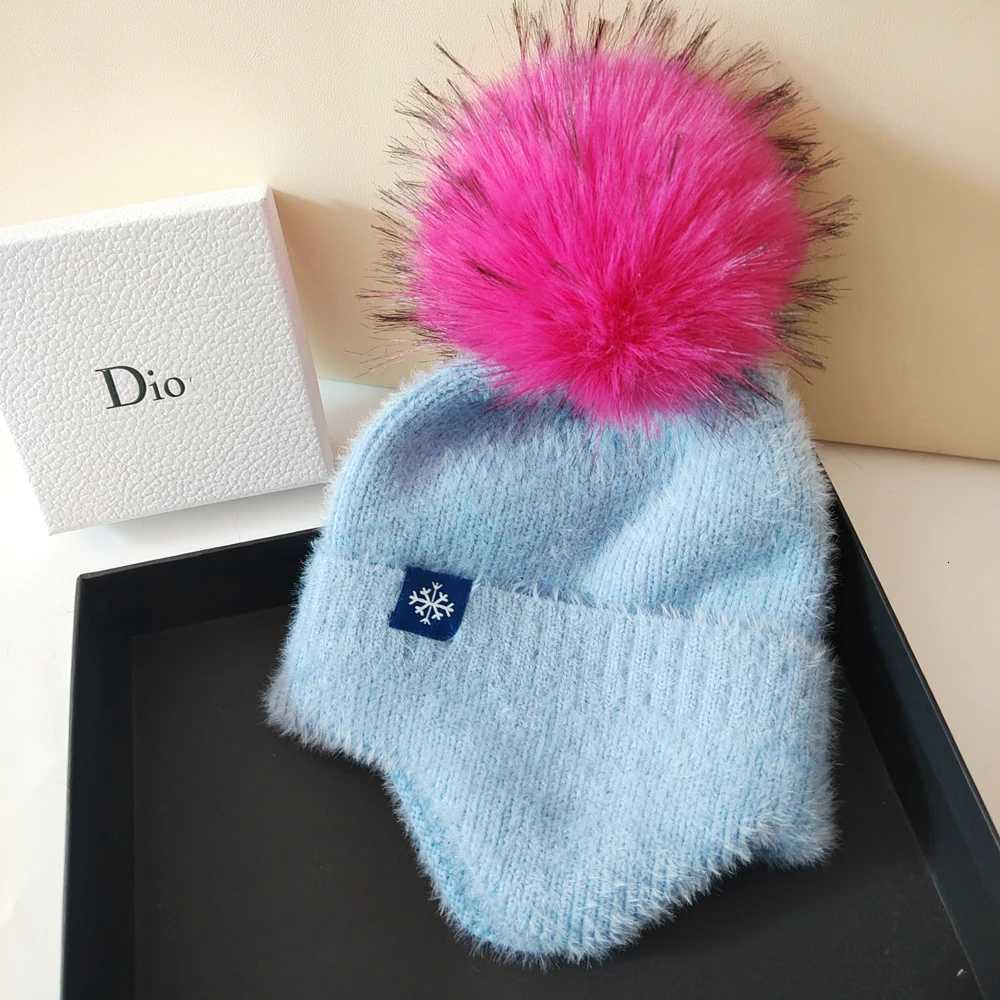 Hot selling couple ear protection hat can color scheme fashionable artificial large wool ball knitted hat Christmas skiingXJ250910