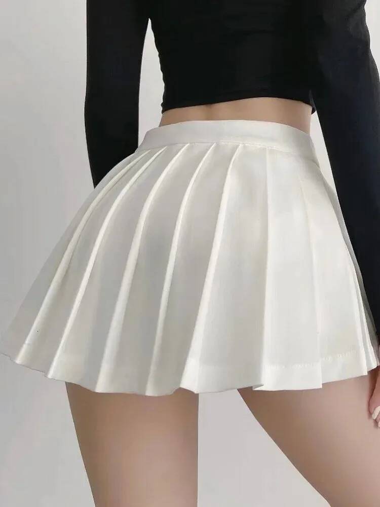 Spice girl pleated female pure color small short summer new Korean version JK college wind high waist mini skirt dongdumaoyi