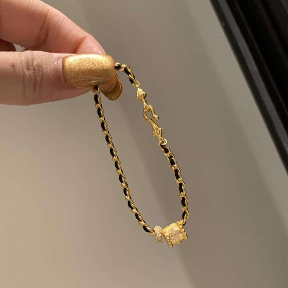 Light High-End Feel Slim Waist Black Gold Woven Bracelet for Women, Unique and Versatile Hand Chain with Distinctive Niche Design