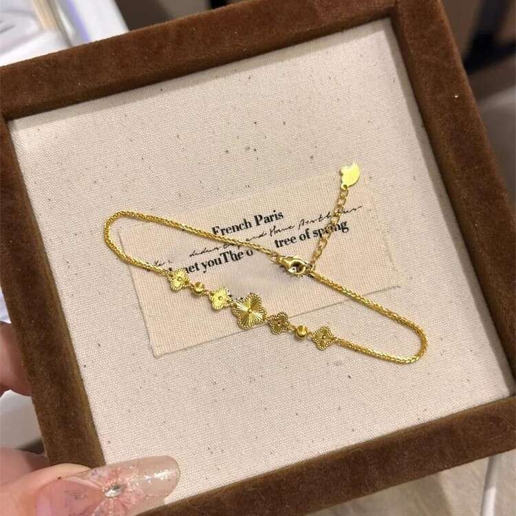 Traditional Gold Laser Four-Leaf Clover Bracelet for Women, Ins Style, Light , Exquisite, High-End Feel, Niche Design, Hand Jewelry