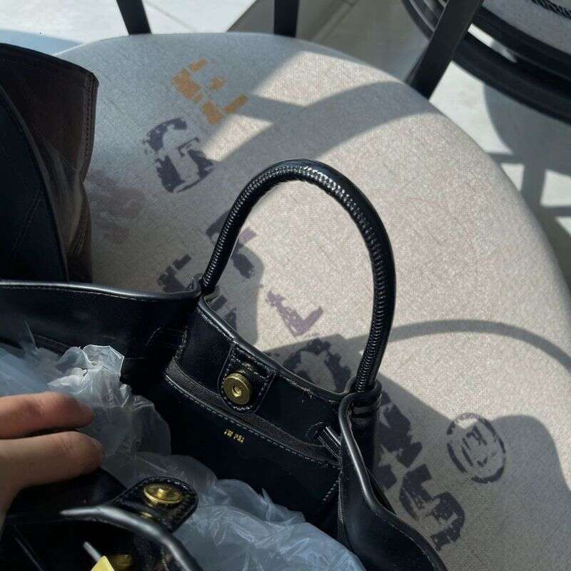 JW New 2025 Design Casual Designer Versatile High-End Dumpling Bag Niche Shoulder Handbag