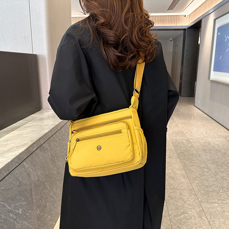 Luxury Bag New Large Capacity Multi Layer Crossbody Bag Solid Free Shipping Color Nylon Casual Shoulder Bag Commuting Versatile Designer Bag Middle Ag