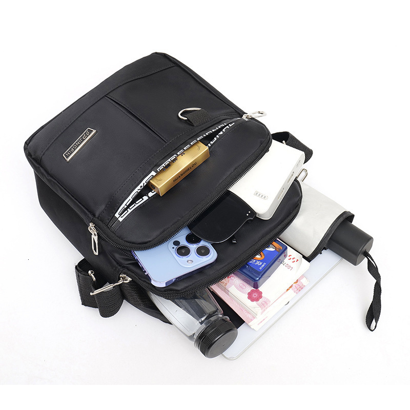 New Men S Vertical Single Shoulder Handbag Korean Free Shipping Version Waterproof Handheld Luxury Bag Crossbody Bag Casual Designer Bag Travel Handba