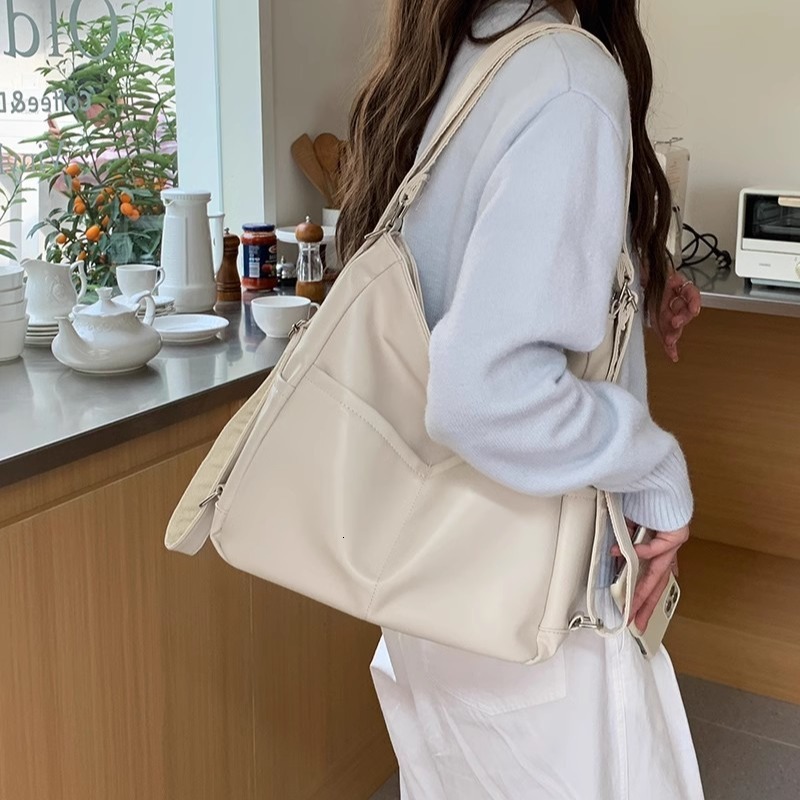 Designer luxury 2025 Spring New Soft Leather Bag for Women Large Capacity Three-in-One Commuter Tote Bag Multifunctional Backpack Crossbody School Bag