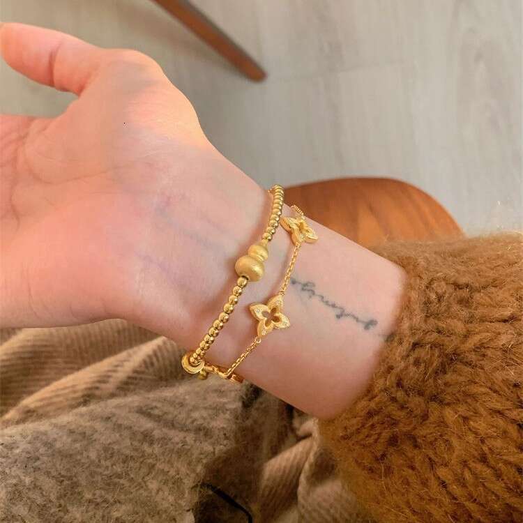 Exquisite High-End Hollow Brushed Four-Leaf Clover Bracelet for Women, Light Noble Bracelet, Niche Design Sense Jewelry