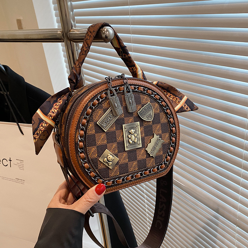 Free shipping designer bag Fashion women's small round bag 2025 new vintage printed handbag casual versatile single shoulder diagonal cross bag k