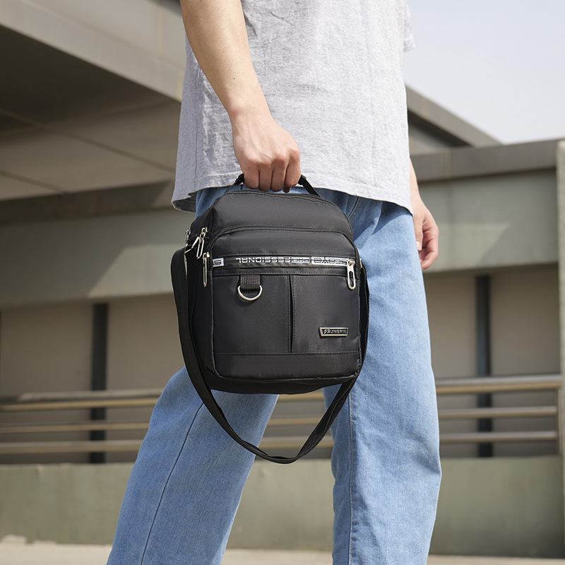 New Men S Vertical Single Shoulder Handbag Korean Free Shipping Version Waterproof Handheld Luxury Bag Crossbody Bag Casual Designer Bag Travel Handba