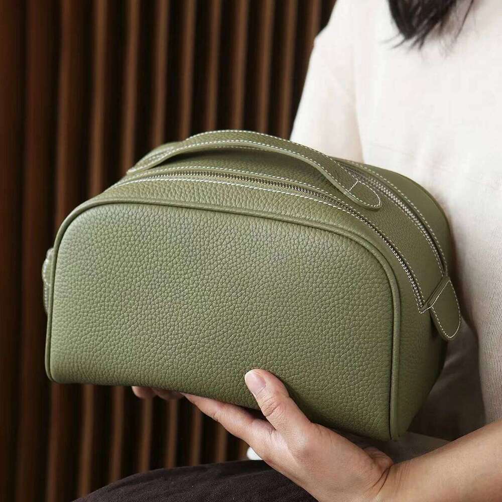 Top layer cowhide makeup 2025 new design genuine leather women's portable travel toiletries vintage ins fashion storage bag