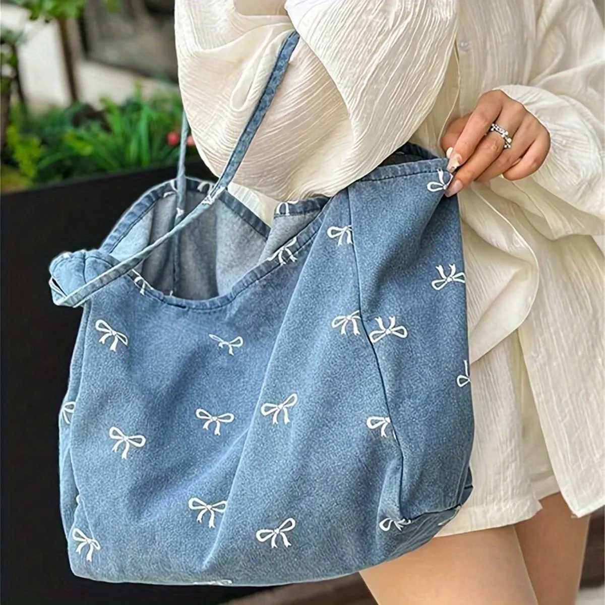 Highquality denim canvas bag ladies bow sweet and versatile tote bag largecapacity casual singleshoulder bag Z250911