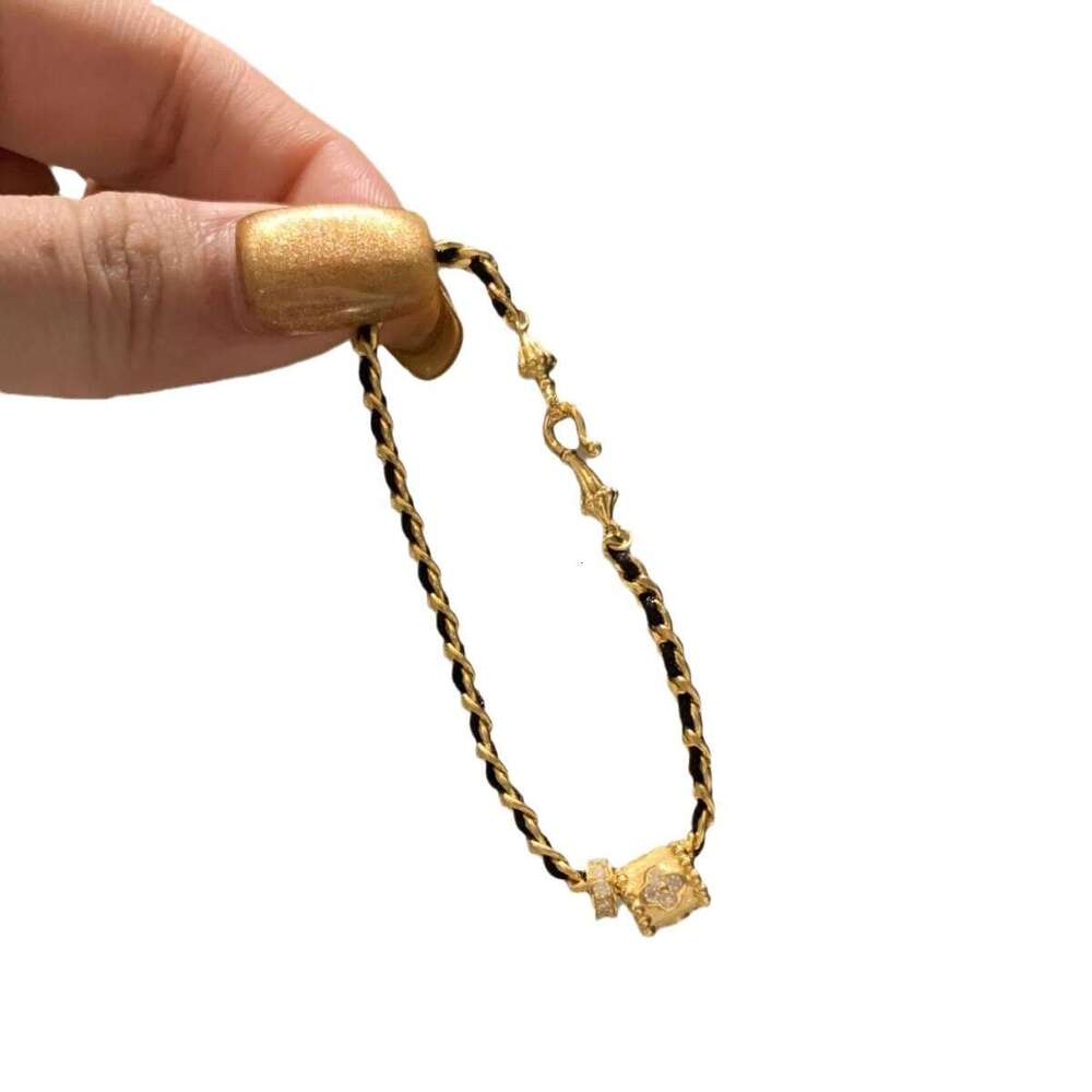 Light High-End Feel Slim Waist Black Gold Woven Bracelet for Women, Unique and Versatile Hand Chain with Distinctive Niche Design