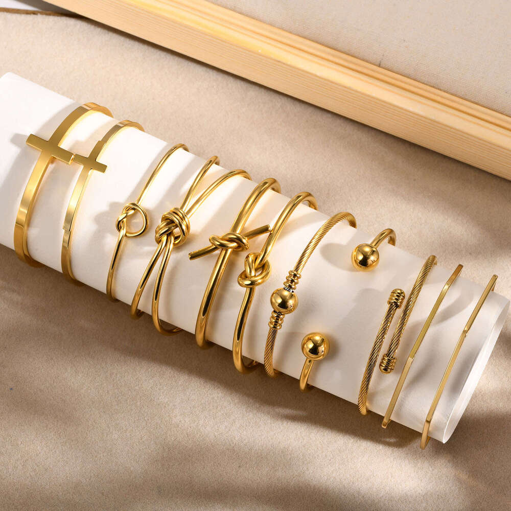 new gold tone bracelet designer bracelet for women Open Bracelet Luxury Jewelry Fashion Simple Geometric Stainless Steel Knot C-shaped Cross border Ac