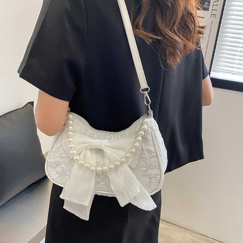 Pearl Female Bag Retro Luxury Designer Handbag Bow Crossbody Bags Fashion Canvas Womens 2024 Trend Shoulder Bag Underarm Bags W250911