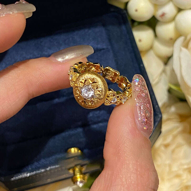 French Light Luxury Buchi Style Brushed Carved Hollow Snowflake High-end Diamond-studded Elegant Niche Ring