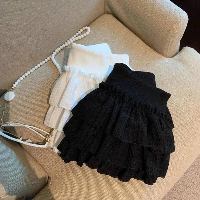 Sweet Puffy Cake Women Skirts Korean Fashion Ruched Ruffle Mini Campus Haruku Casual Versatile Elastic Waist Solid Skirt dongdumaoyi