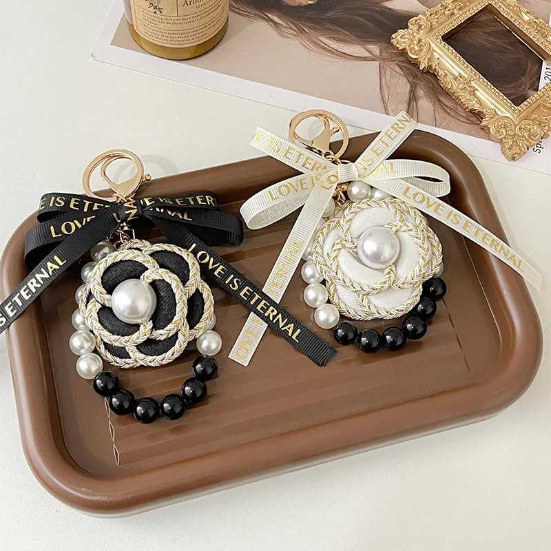 Korea Style Handmade Fabric Bow Tie Black White Pearl Chain Camellia Keychain Car Key Bag Charm Women Girl Keyring Gift Jewelry 1 S250910 AAS