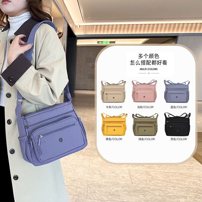 Luxury Bag New Large Capacity Multi Layer Crossbody Bag Solid Free Shipping Color Nylon Casual Shoulder Bag Commuting Versatile Designer Bag Middle Ag