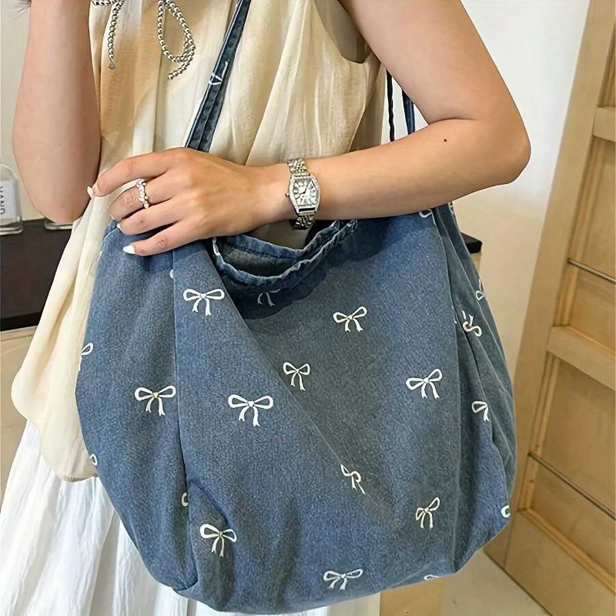 Highquality denim canvas bag ladies bow sweet and versatile tote bag largecapacity casual singleshoulder bag Z250911