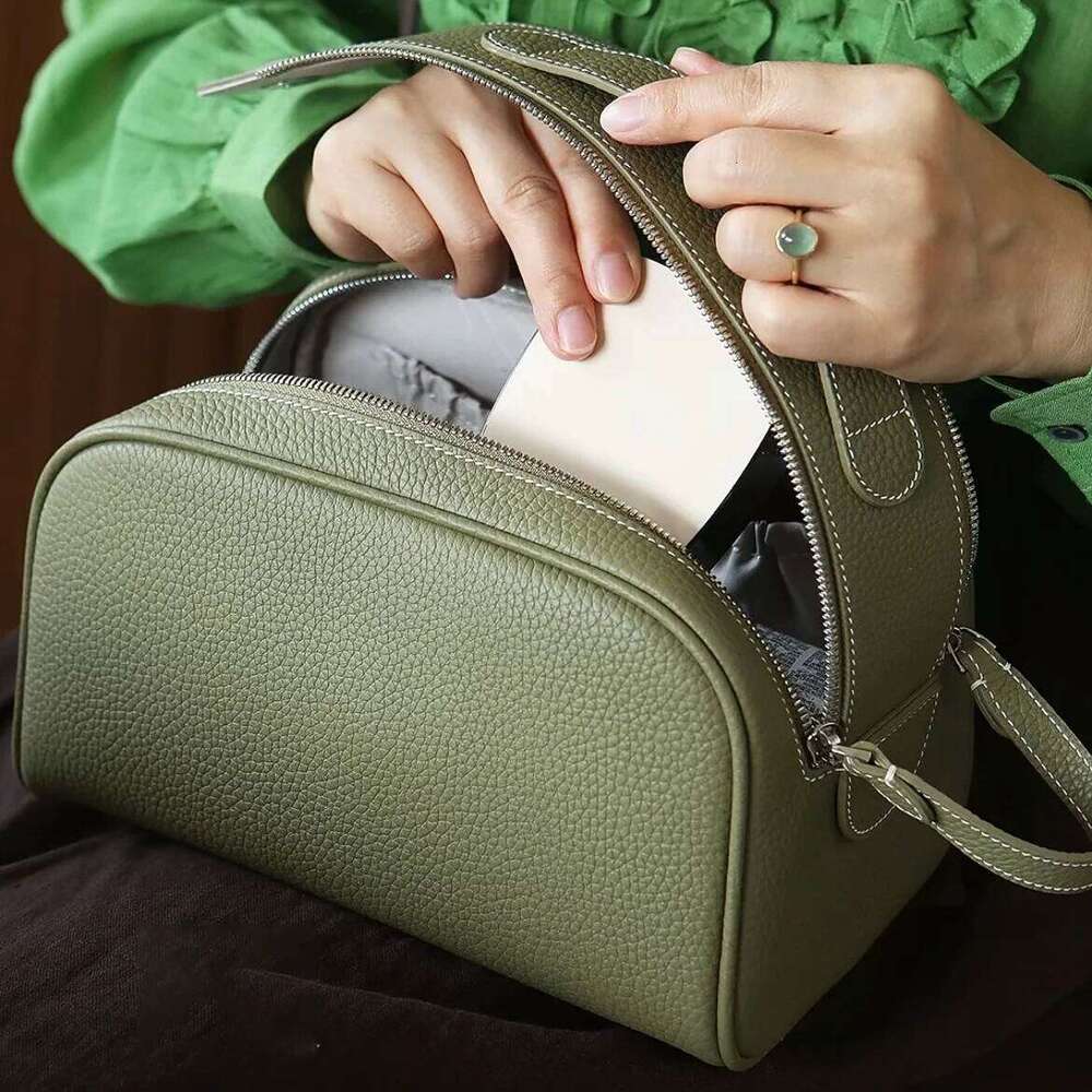 Top layer cowhide makeup 2025 new design genuine leather women's portable travel toiletries vintage ins fashion storage bag