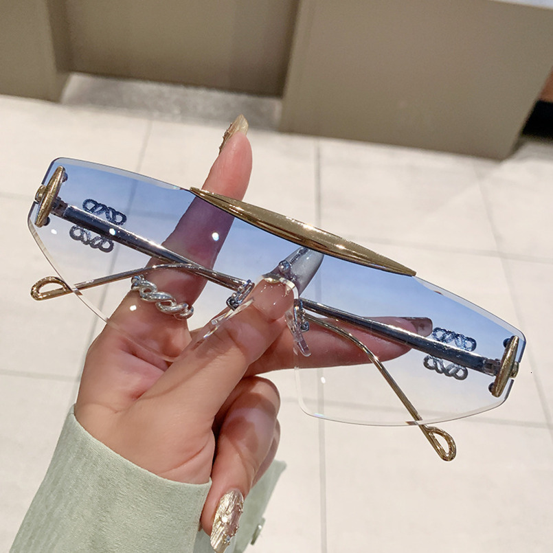 New Frameless Men, Trendy Ins Style, Fashionable and Unique Cat Eye Sunglasses for Women high quality