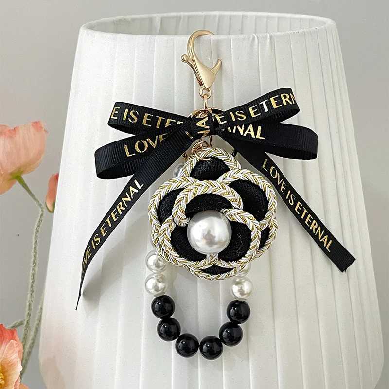 Korea Style Handmade Fabric Bow Tie Black White Pearl Chain Camellia Keychain Car Key Bag Charm Women Girl Keyring Gift Jewelry 1 S250910 AAS