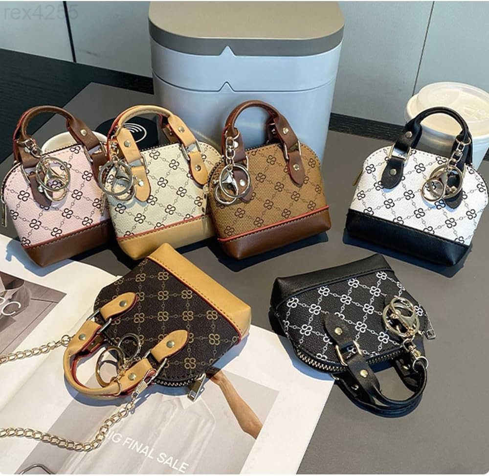 Keychain Coin Purse for WomenCute Change Purse with Keyring Unique Purse Charms Small Coin Pouch Mini Purses Keychain Wallet with Tassels YWhiteW25091