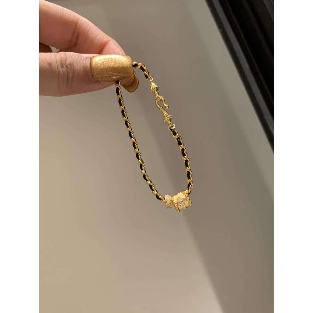 Light High-End Feel Slim Waist Black Gold Woven Bracelet for Women, Unique and Versatile Hand Chain with Distinctive Niche Design