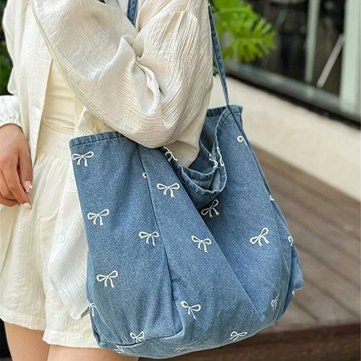 Highquality denim canvas bag ladies bow sweet and versatile tote bag largecapacity casual singleshoulder bag Z250911