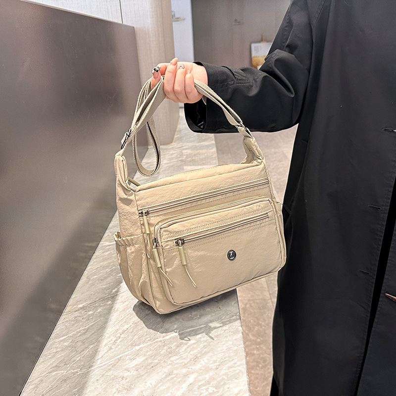 Luxury Bag New Large Capacity Multi Layer Crossbody Bag Solid Free Shipping Color Nylon Casual Shoulder Bag Commuting Versatile Designer Bag Middle Ag