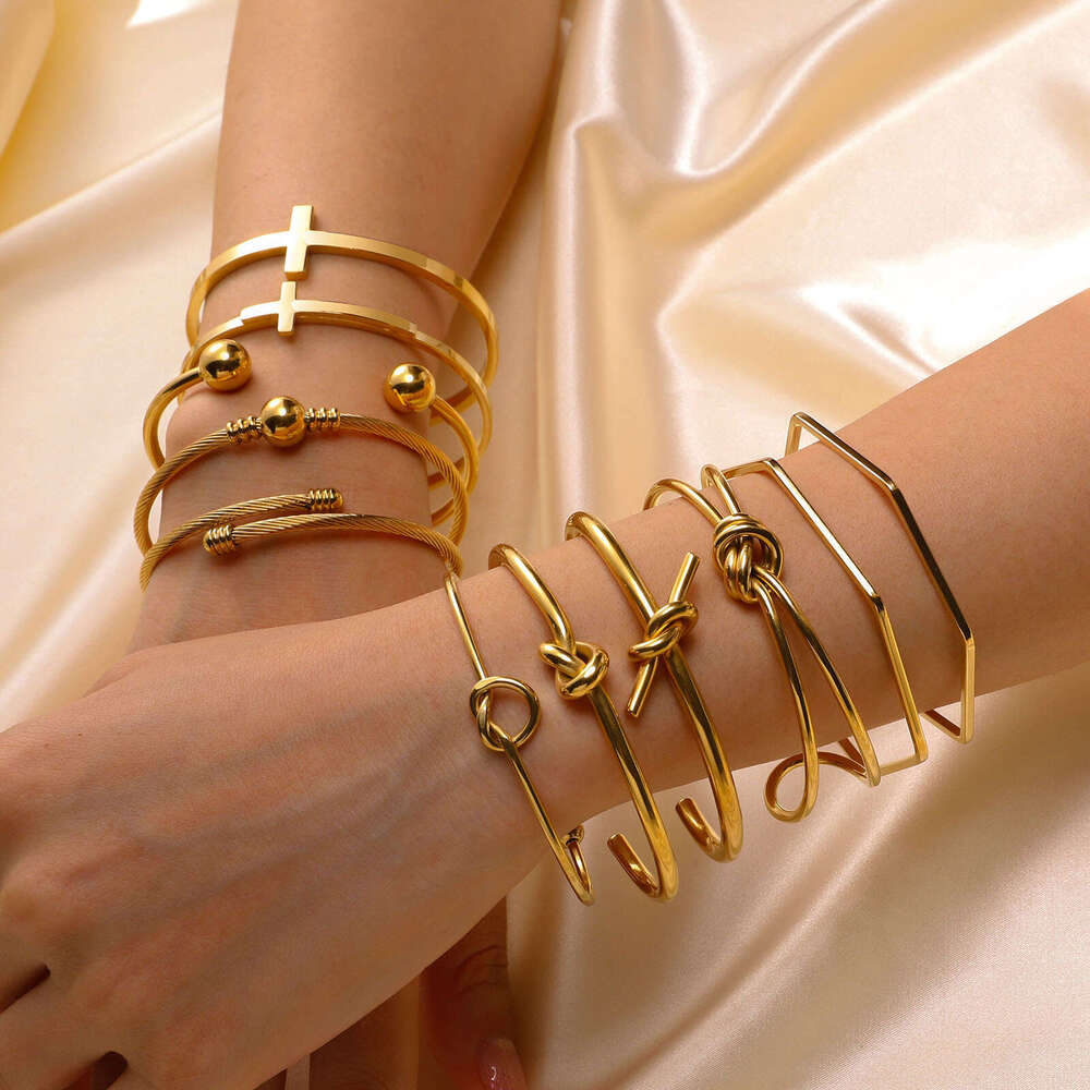 new gold tone bracelet designer bracelet for women Open Bracelet Luxury Jewelry Fashion Simple Geometric Stainless Steel Knot C-shaped Cross border Ac